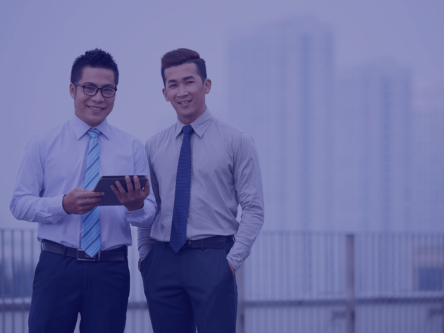 two men standing next to each other - outbooks blog future trends in accounting