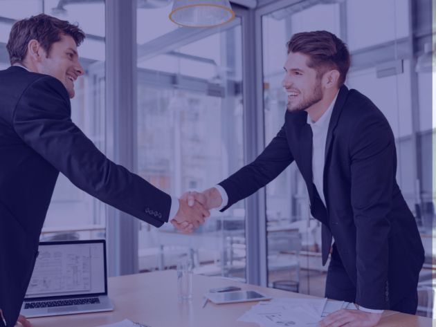two men shaking hands at a table - Corporate Governance -Outbooks